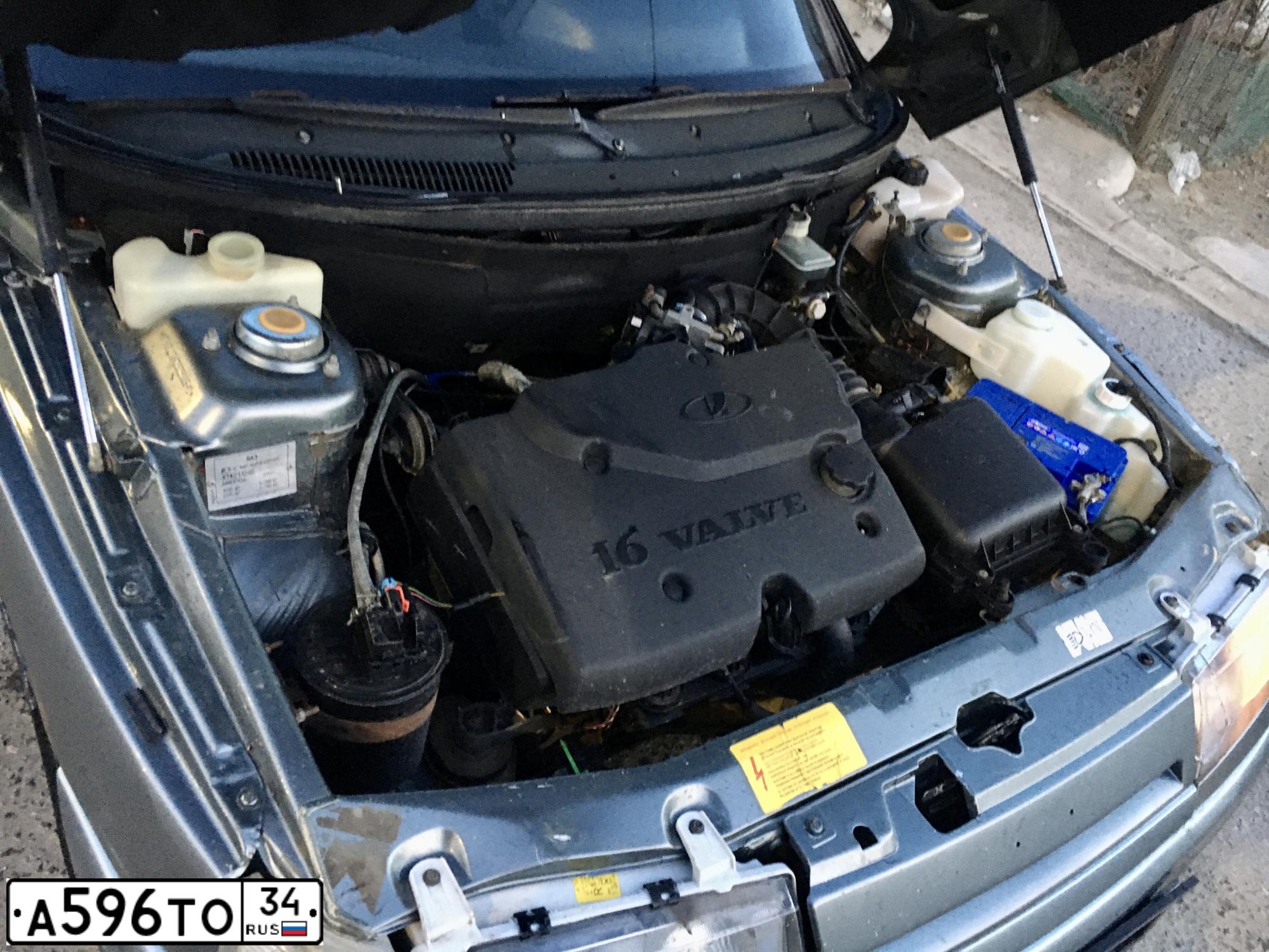 Фото автомобиля LADA 2112 LADA, 2005 — госномер А596ТО34. Цвет: СРЕДНИЙ СЕРО-ЗЕЛЕНЫЙ МЕТ.