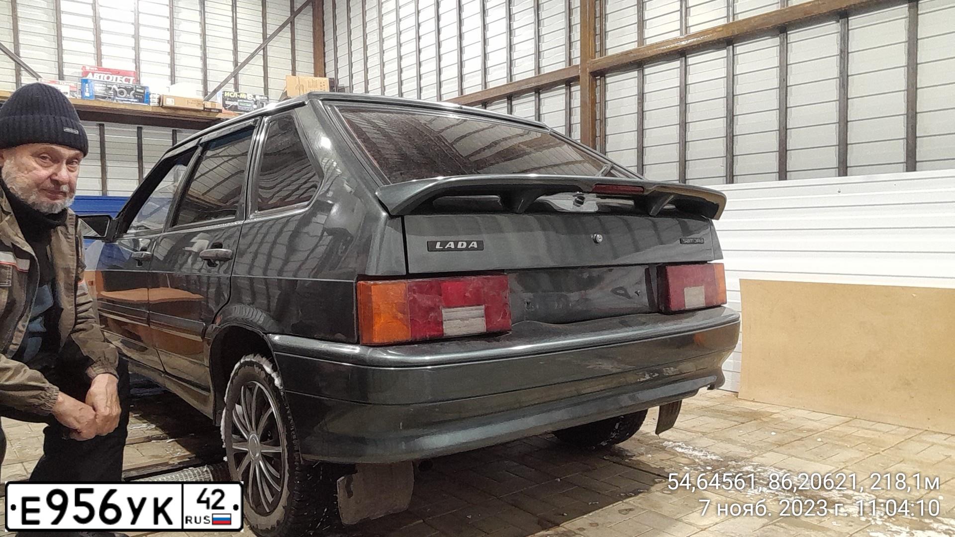Фото автомобиля LADA 2114 SAMARA, 2010 — госномер Е956УК42. Цвет: СЕРО-СИНЕ-ЗЕЛЕНЫЙ