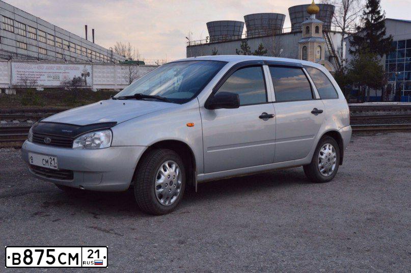 Фото автомобиля MAZDA 323, 2005 — госномер К452РВ12. Цвет: Красный
