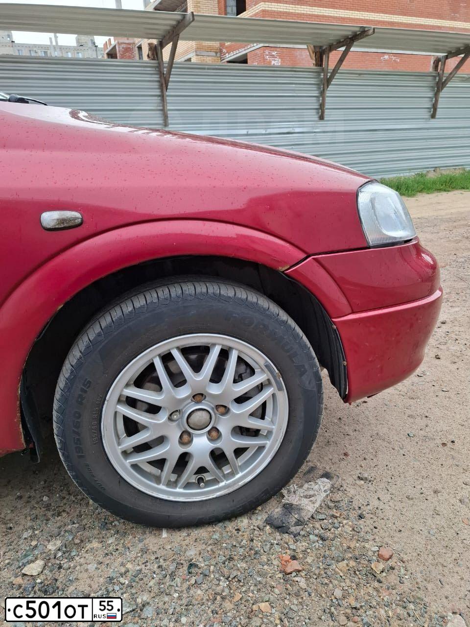 Фото автомобиля CHEVROLET VIVA, 2007 — госномер А869СЕ155. Цвет: КРАСНЫЙ МЕТАЛЛИК