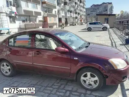 Фото автомобиля VORTEX ESTINA, 2010 — госномер Р028ВМ761. Цвет: Красный