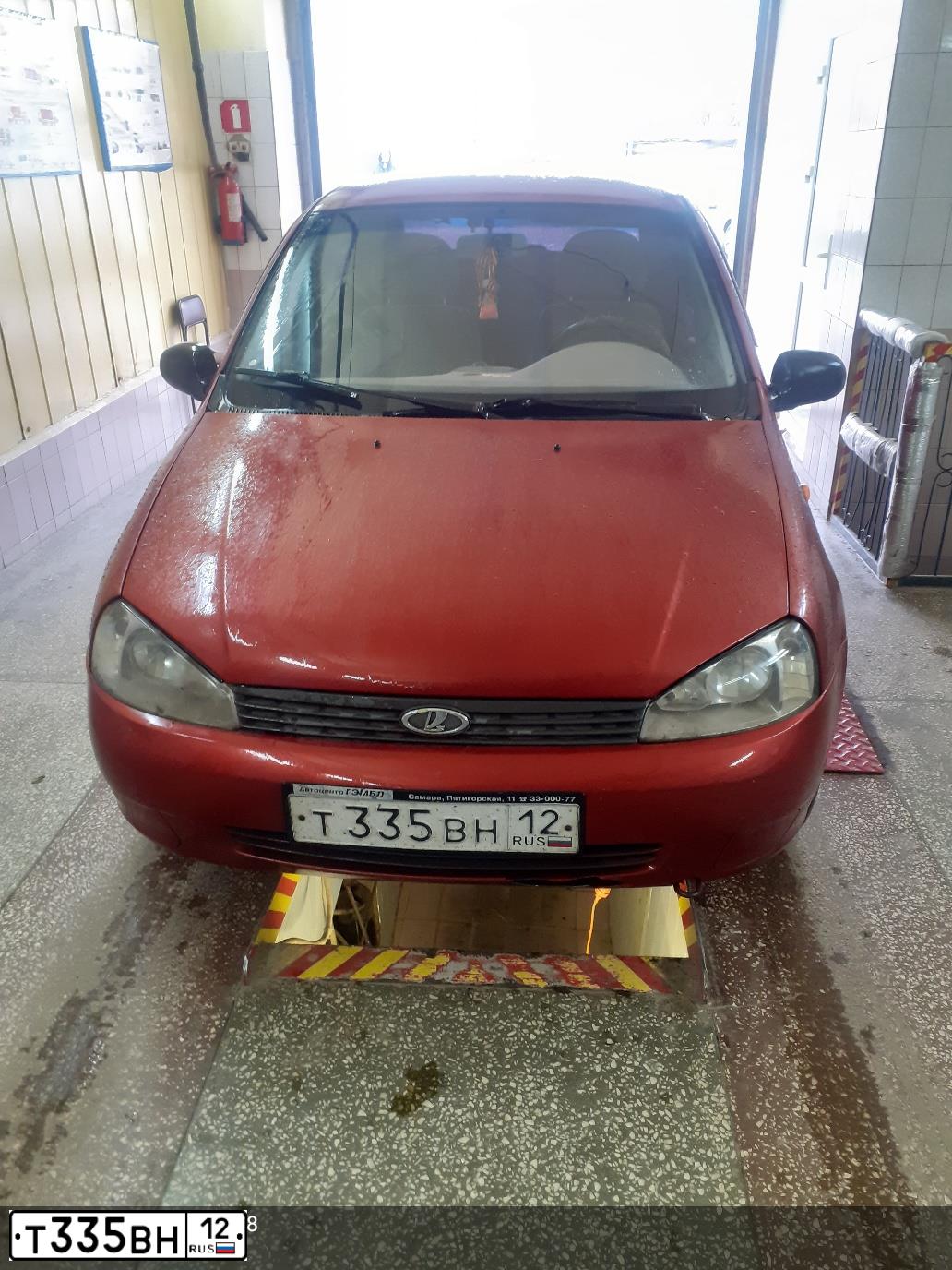 Фото автомобиля LADA KALINA, 2007 — госномер Н025ВА180. Цвет: СЕРЕБРИСТО-КРАСНЫЙ