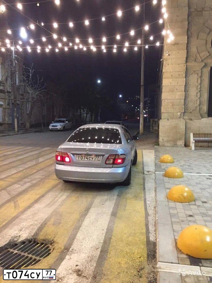 Фото автомобиля НИССАН ALMERA, 2004 — госномер Р742ТЕ05. Цвет: голубой