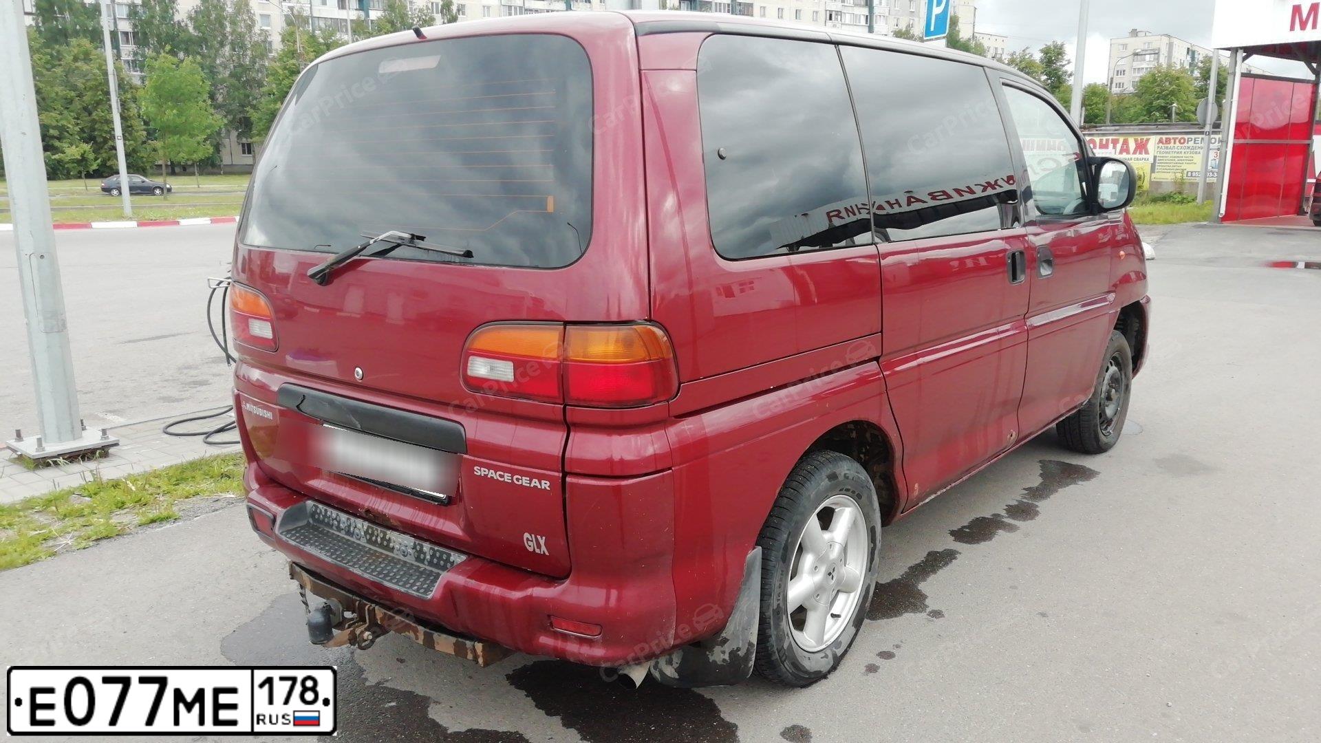 Фото автомобиля MITSUBISHI OUTLANDER, 2019 — госномер Е077МЕ198