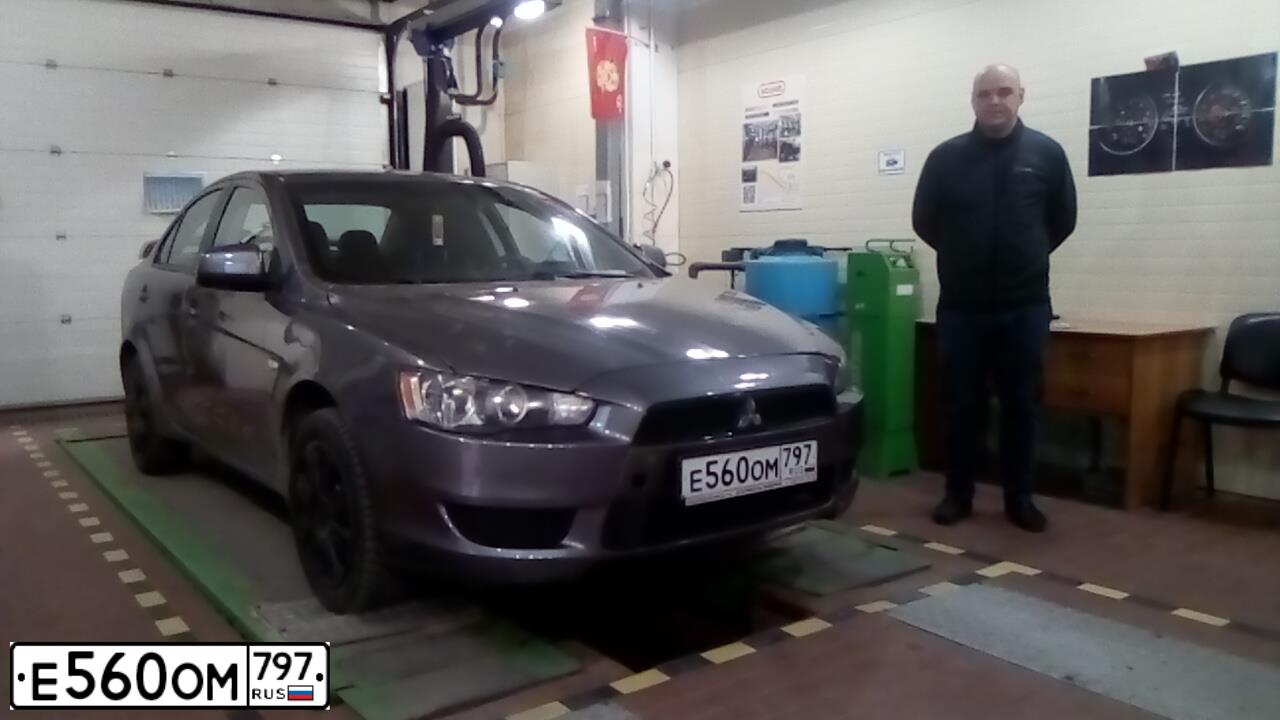 Фото автомобиля MITSUBISHI LANCER, 2008 — госномер Е560ОМ797. Цвет: СЕРЫЙ