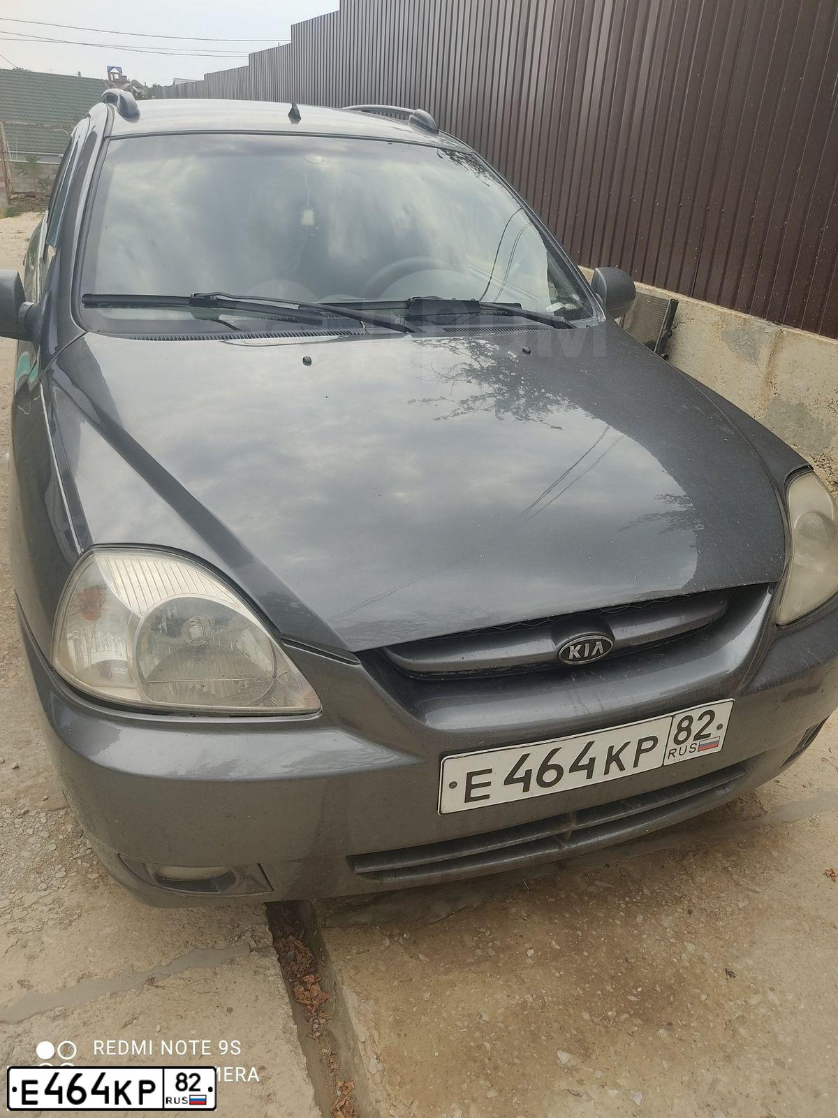 Фото автомобиля KIA RIO, 2004 — госномер Е464КР82. Цвет: СЕРЫЙ