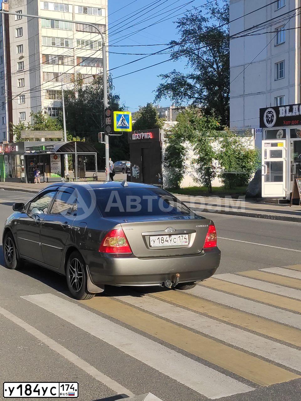 Фото автомобиля TOYOTA COROLLA, 2006 — госномер У184УС174. Цвет: СЕРЫЙ