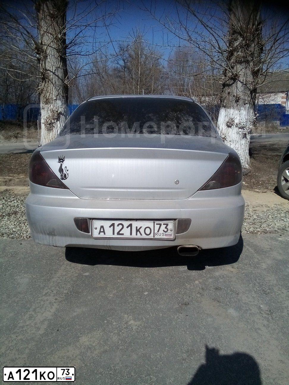 Фото автомобиля KIA SPECTRA, 2007 — госномер А121КО73. Цвет: СЕРЫЙ