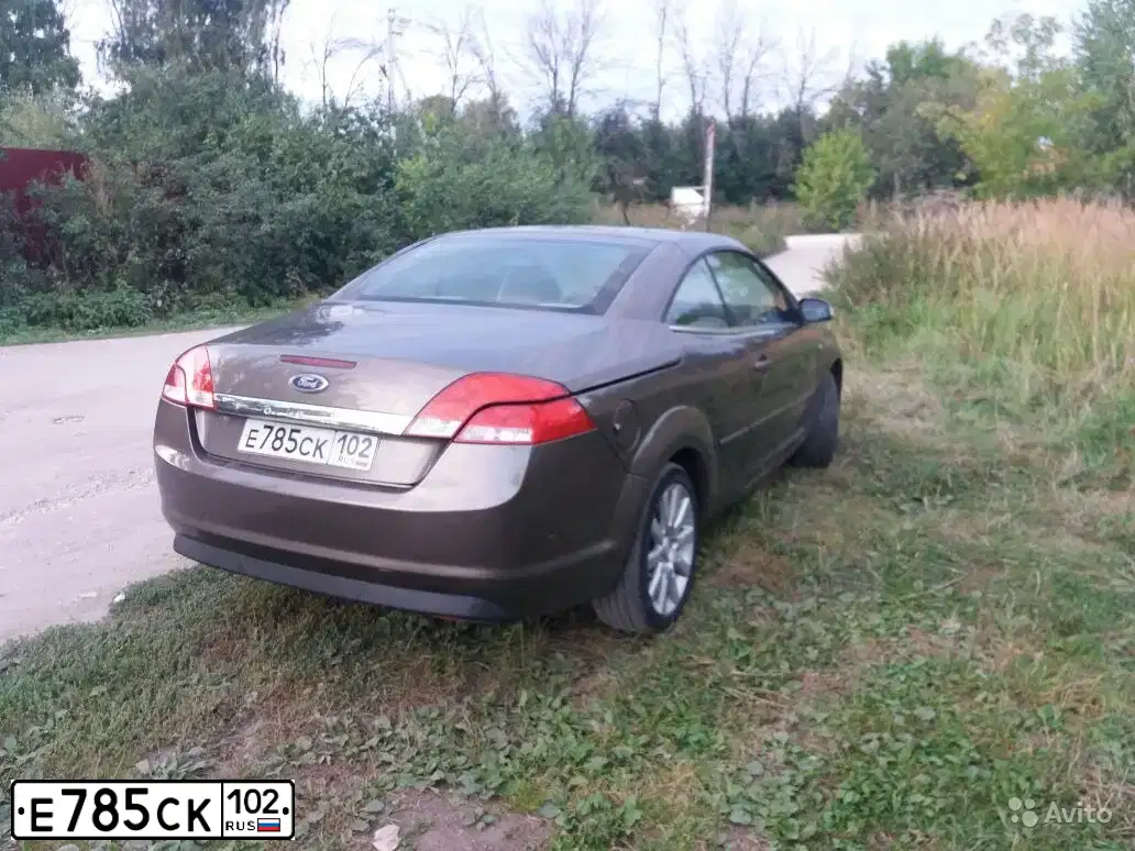 Фото автомобиля FORD FOCUS, 2007 — госномер О797РТ750. Цвет: СВЕТЛО-КОРИЧНЕВЫЙ