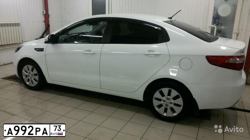 Фото автомобиля KIA RIO, 2012 — госномер А992РА73. Цвет: БЕЛЫЙ