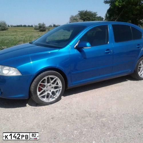 Фото автомобиля SKODA OCTAVIA, 2008 — госномер К901КН161. Цвет: синий