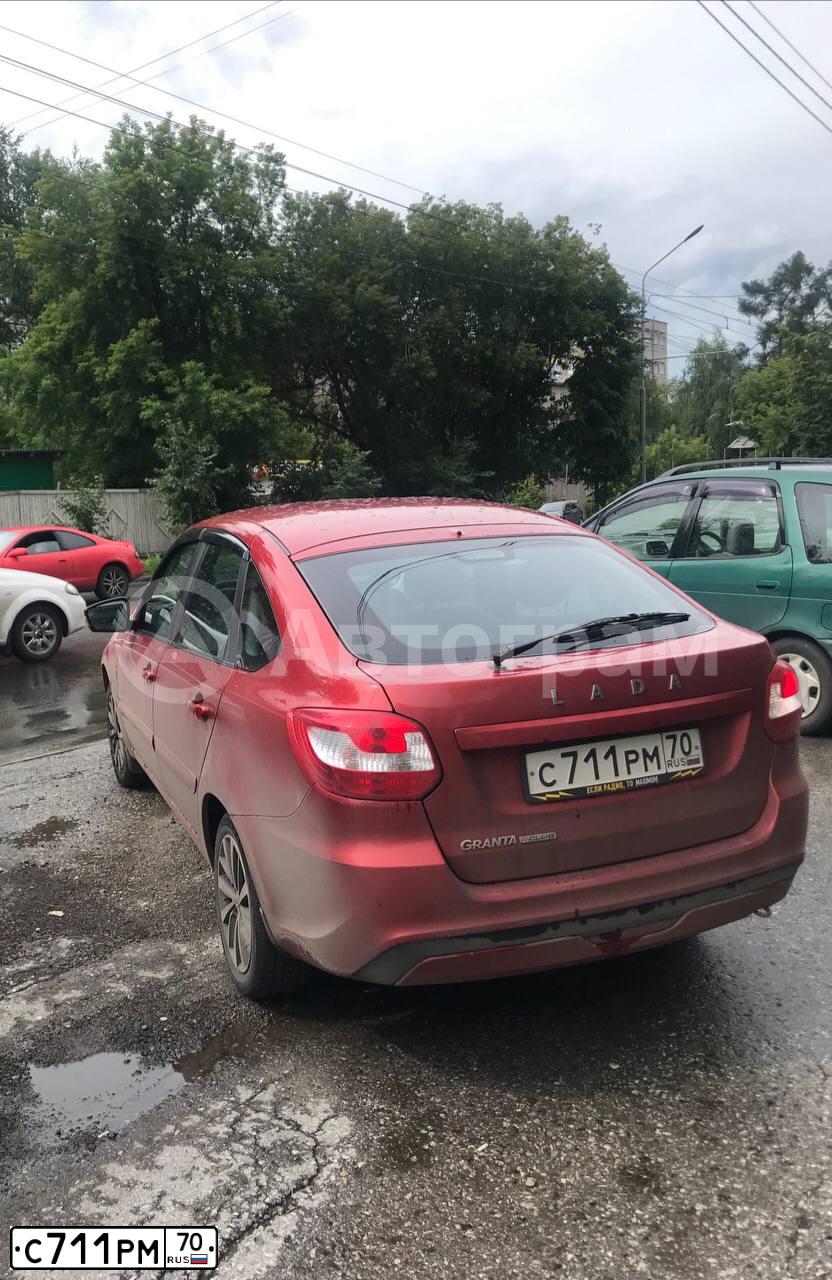 Фото автомобиля LADA 2191 GRANTA, 2020 — госномер С711РМ70. Цвет: Красный