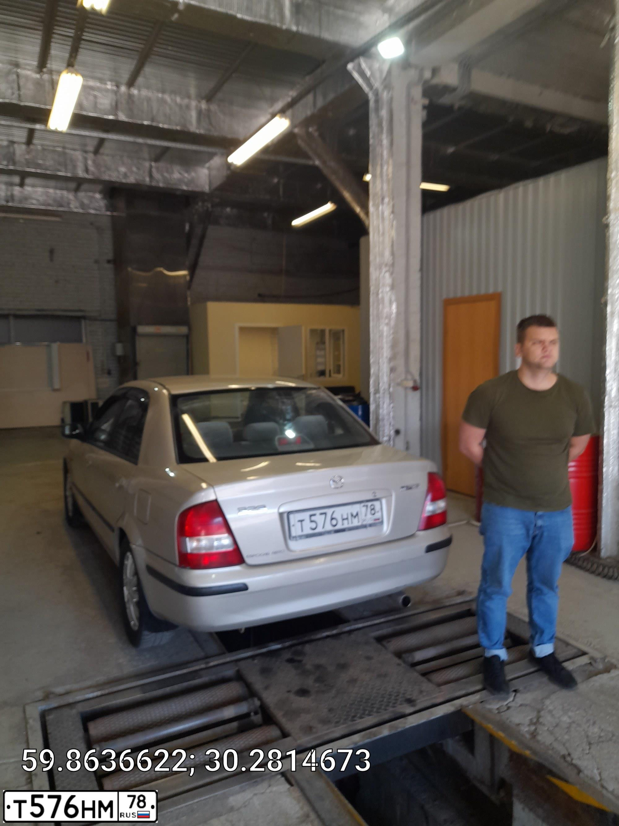 Фото автомобиля MAZDA 323, 1999 — госномер Е386АМ147