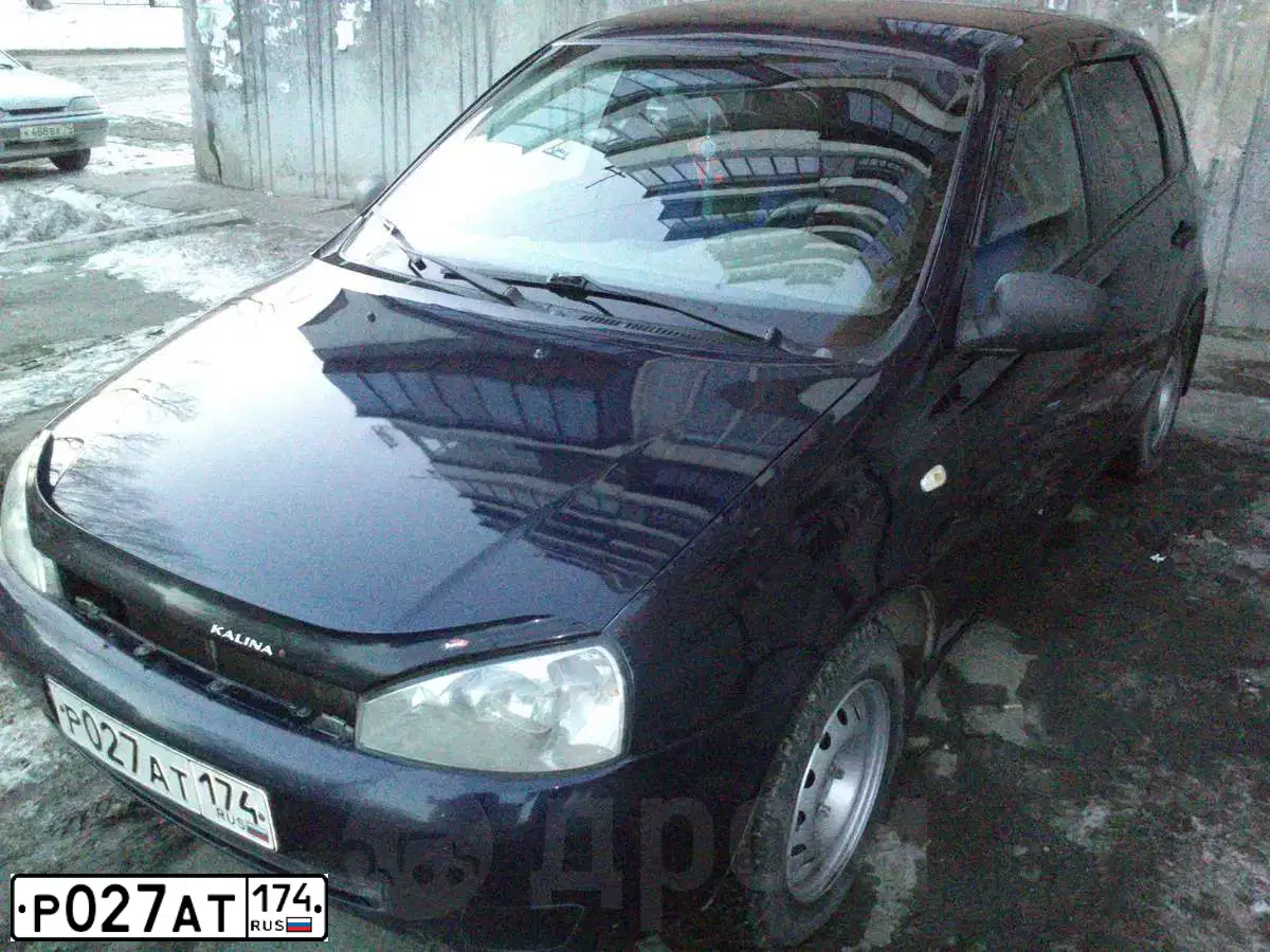 Фото автомобиля LADA 1119 KALINA, 2007 — госномер Р027АТ174. Цвет: ТЕМНО-СИНИЙ
