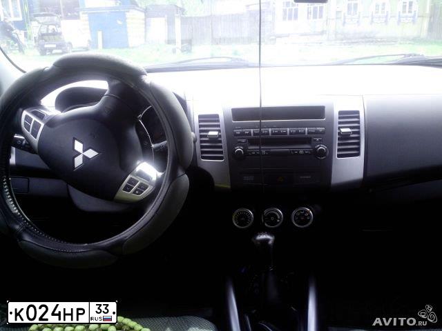Фото автомобиля MITSUBISHI OUTLANDER, 2008 — госномер К024НР33. Цвет: ЧЕРНЫЙ