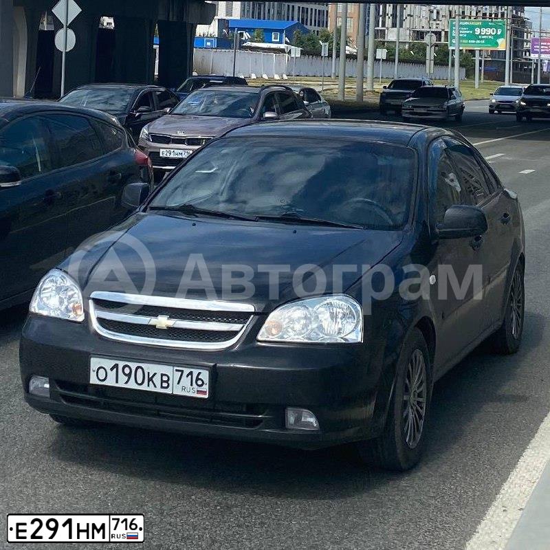 Фото автомобиля KIA RIO, 2020 — госномер Е291НМ716. Цвет: Коричневый