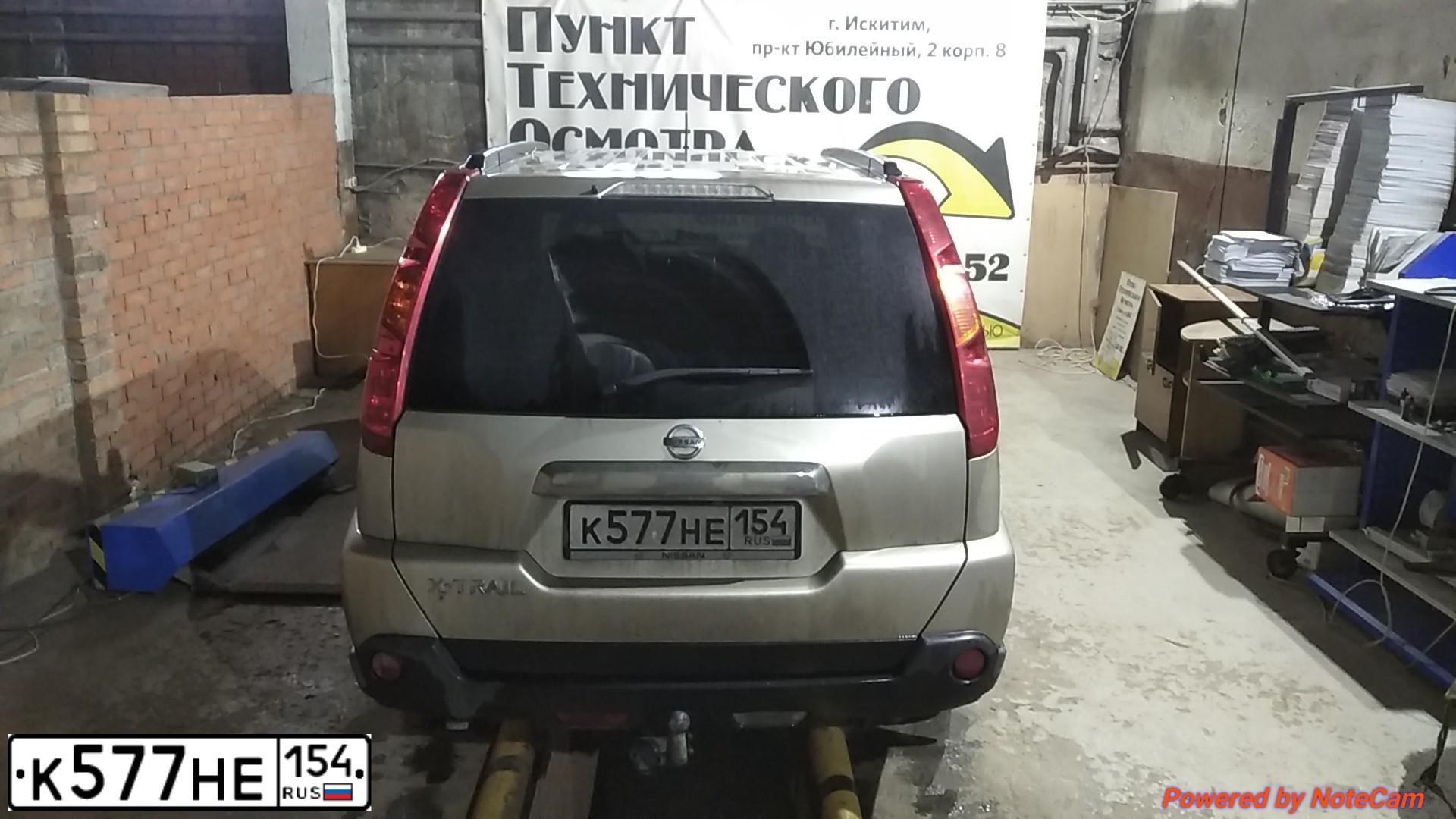 Фото автомобиля NISSAN X-TRAIL, 2010 — госномер К577НЕ154. Цвет: ЗОЛОТИСТЫЙ