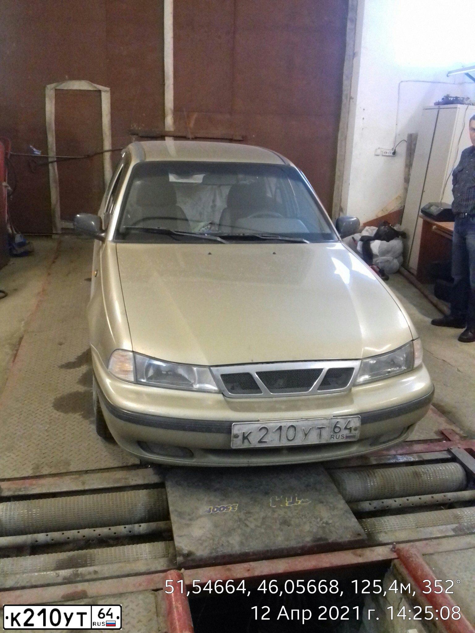 Фото автомобиля DAEWOO NEXIA, 2008 — госномер К210УТ64. Цвет: ЖЕЛТЫЙ