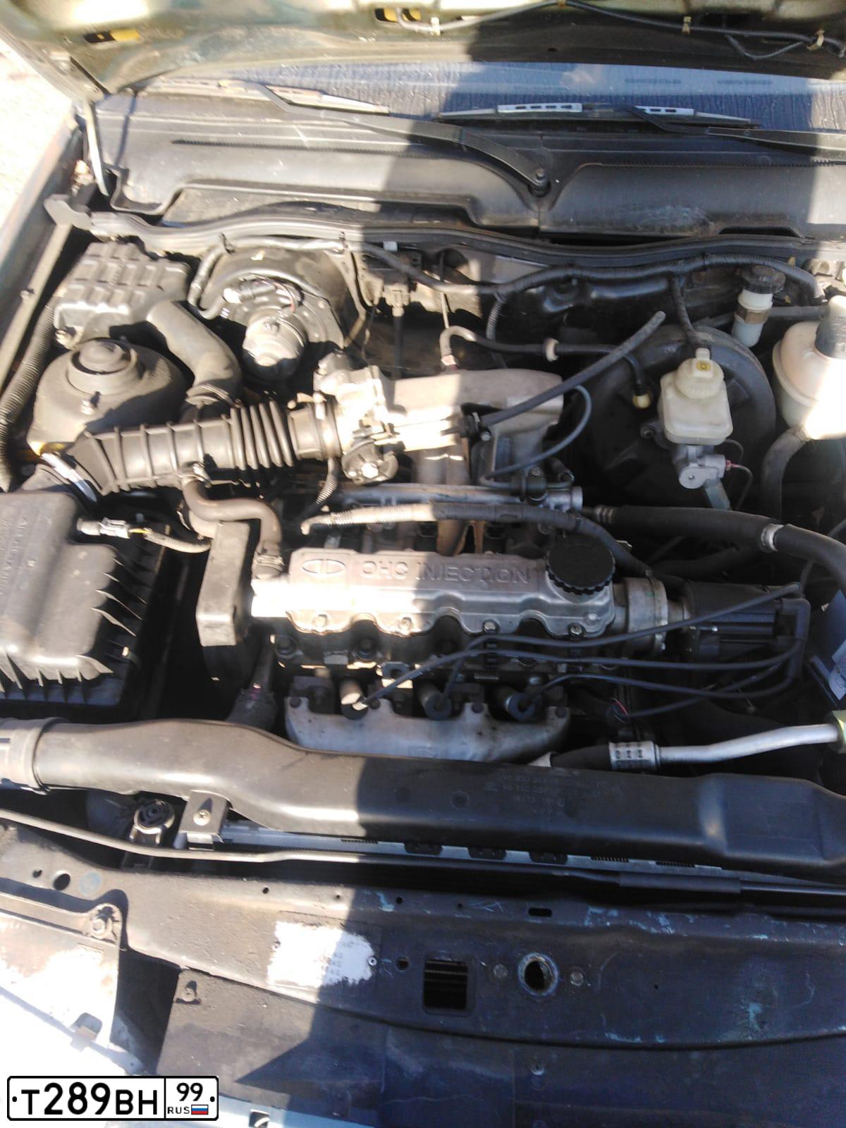 Фото автомобиля DAEWOO NEXIA, 1998 — госномер Т289ВН99. Цвет: СЕРЫЙ