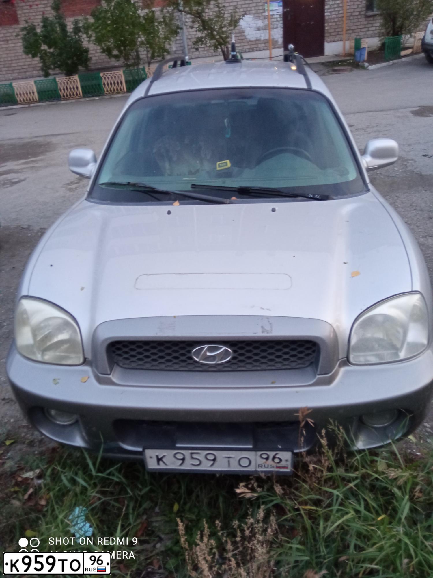 Фото автомобиля ХЕНДЭ САНТА ФЕ 2.7 GLS 4WD, 2004 — госномер К959ТО96. Цвет: СВЕТЛО-СЕРЫЙ