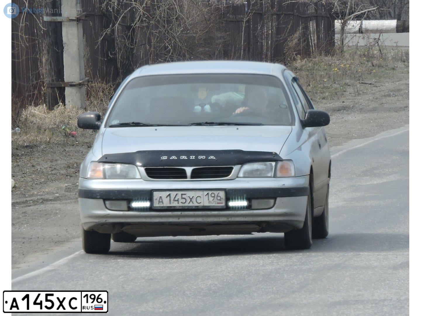 Фото автомобиля TOYOTA CARINA, 1996 — госномер А145СХ196. Цвет: СВЕТЛО-СЕРЫЙ