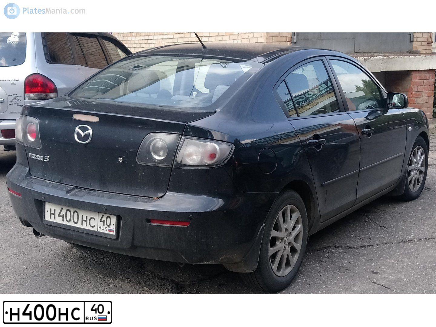 Фото автомобиля SUZUKI LIANA, 2003 — госномер Е861НМ03. Цвет: Красный