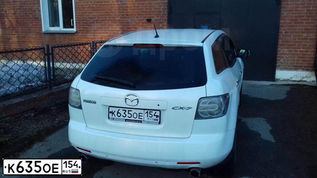 Фото автомобиля MAZDA CX-7, 2008 — госномер Т555МК199. Цвет: Белый