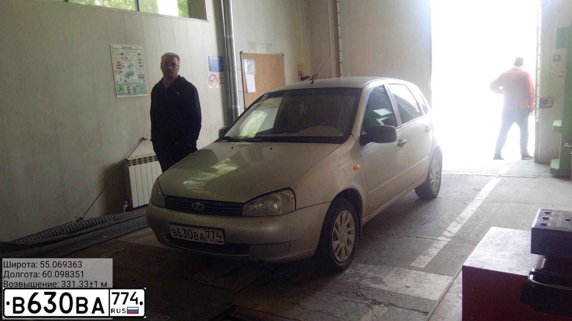 Фото автомобиля LADA 1119 KALINA, 2012 — госномер Е677КУ774. Цвет: Серебристый