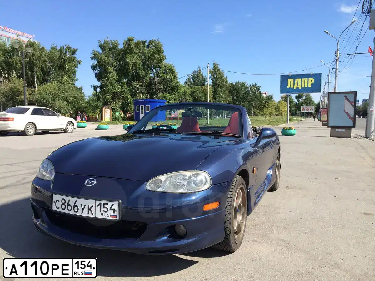 Фото автомобиля TOYOTA CAMRY, 2013 — госномер А110РЕ154. Цвет: ЧЕРНЫЙ МЕТАЛЛИК