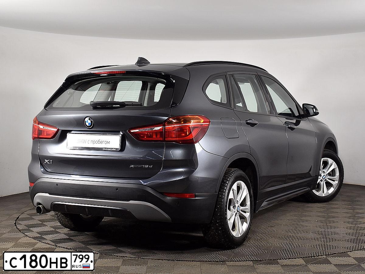 Фото автомобиля BMW X1, 2018 — госномер Х176УУ799. Цвет: СЕРЫЙ
