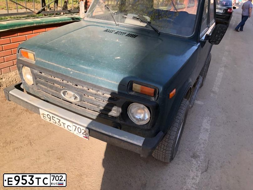 Фото автомобиля ВАЗ 21214, 2006 — госномер Е953ТС702. Цвет: сине-зеленый