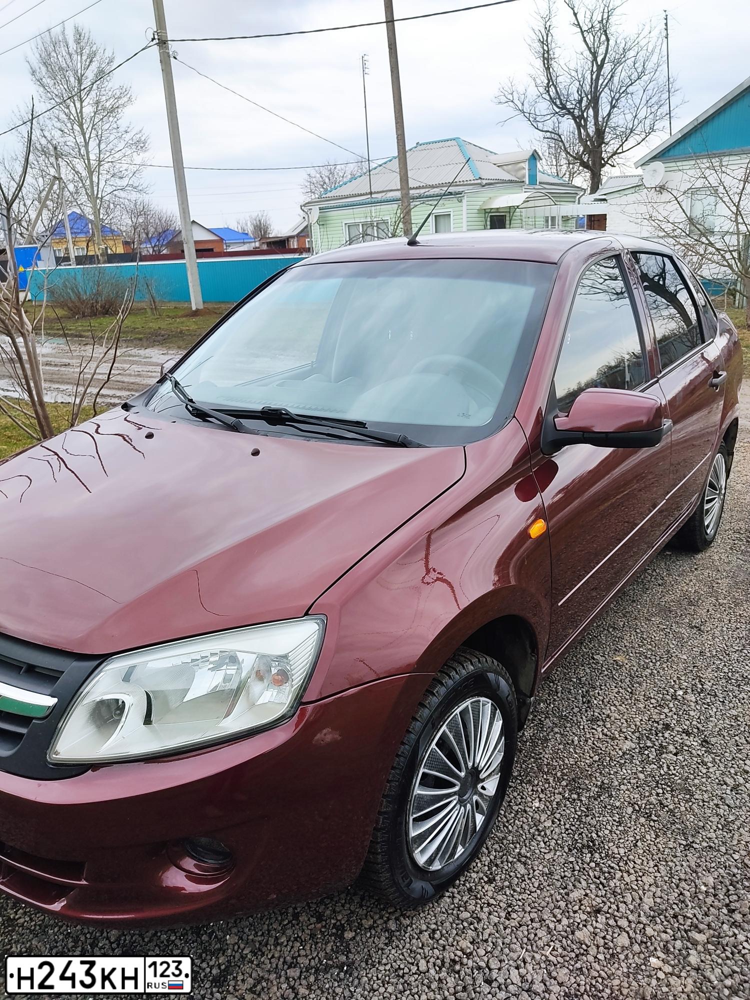 Фото автомобиля LADA 2190 GRANTA, 2013 — госномер К057ЕХ123. Цвет: СЕРЕБРИСТО - КРАСНЫЙ