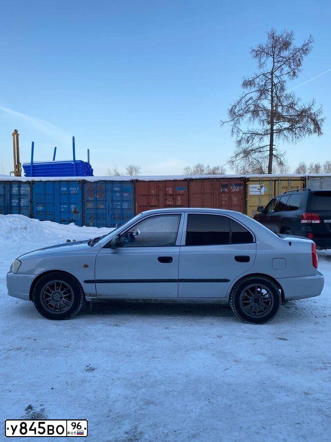 Фото автомобиля TAGAZ ACCENT, 2005 — госномер К823ТО196. Цвет: СВЕТЛО-СЕРЫЙ