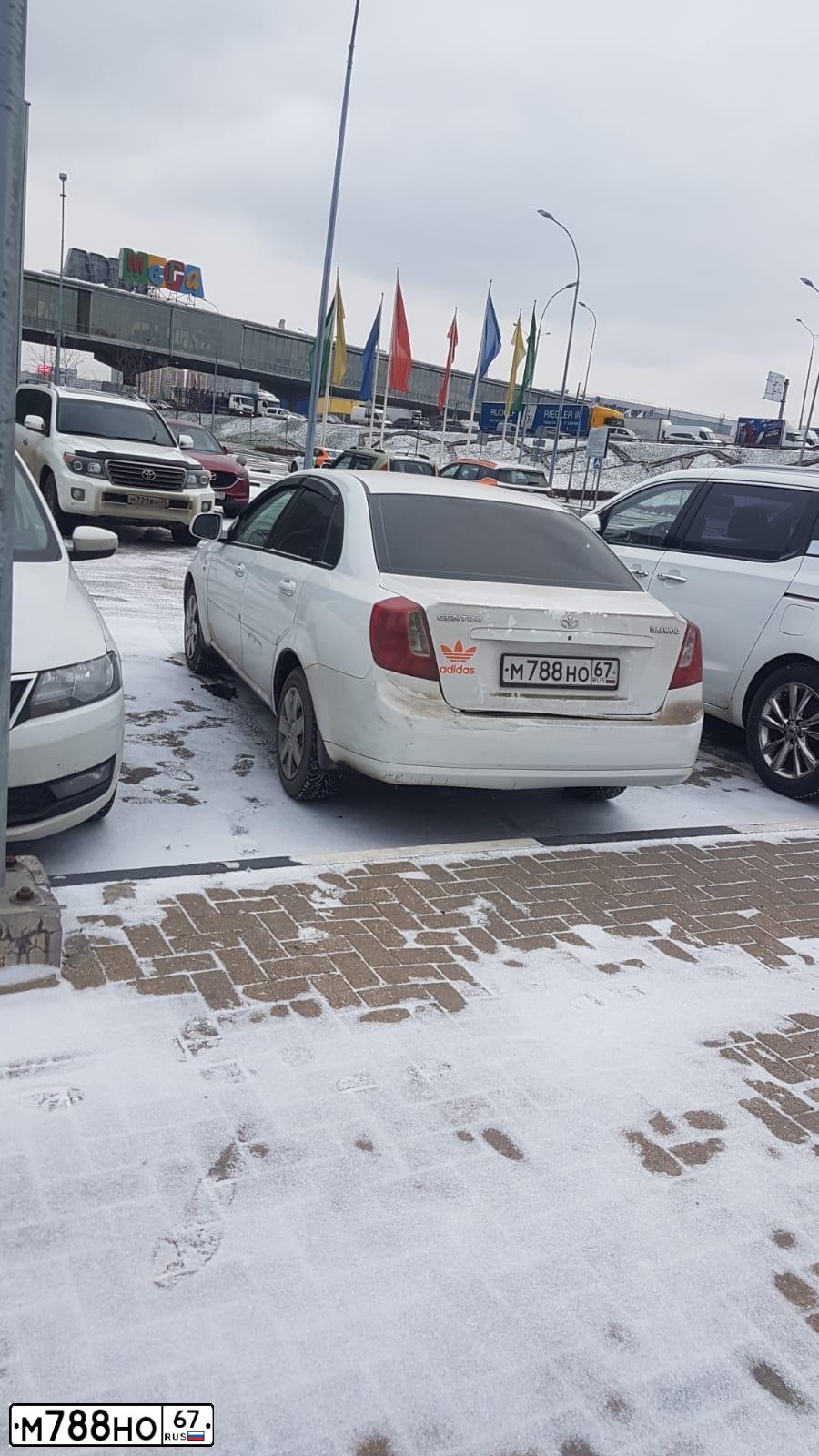 Фото автомобиля DAEWOO GENTRA, 2014 — госномер М759ТТ82. Цвет: Белый