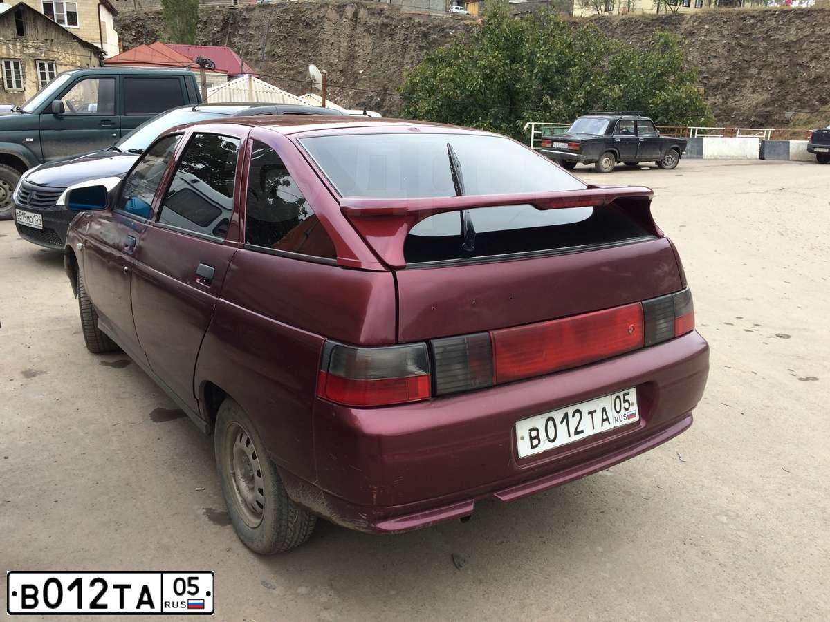 Фото автомобиля LADA 2112, 2005 — госномер В012ТА05. Цвет: МАЛИНОВЫЙ