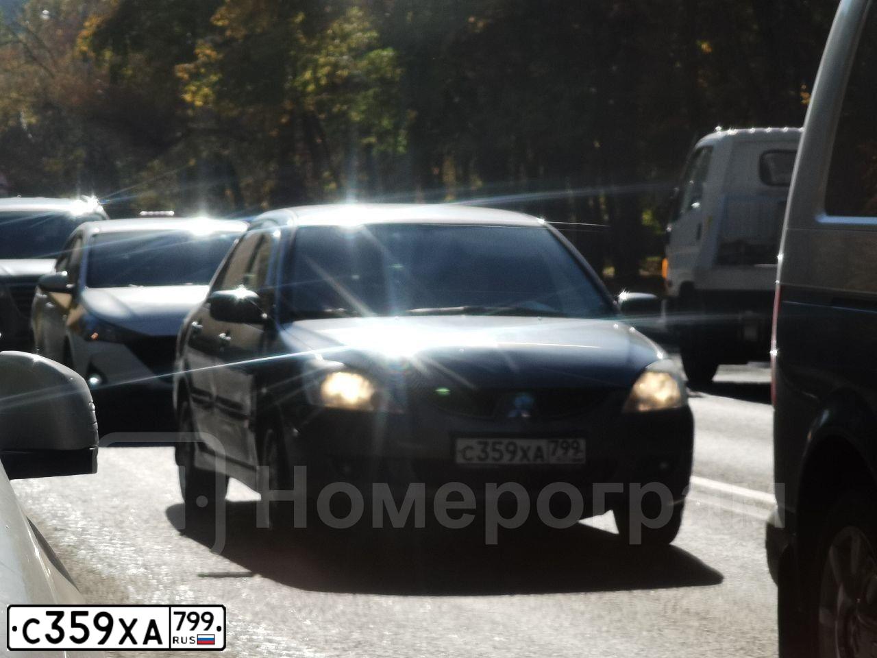 Фото автомобиля MITSUBISHI LANCER, 2005 — госномер Т746МХ790. Цвет: СЕРЫЙ