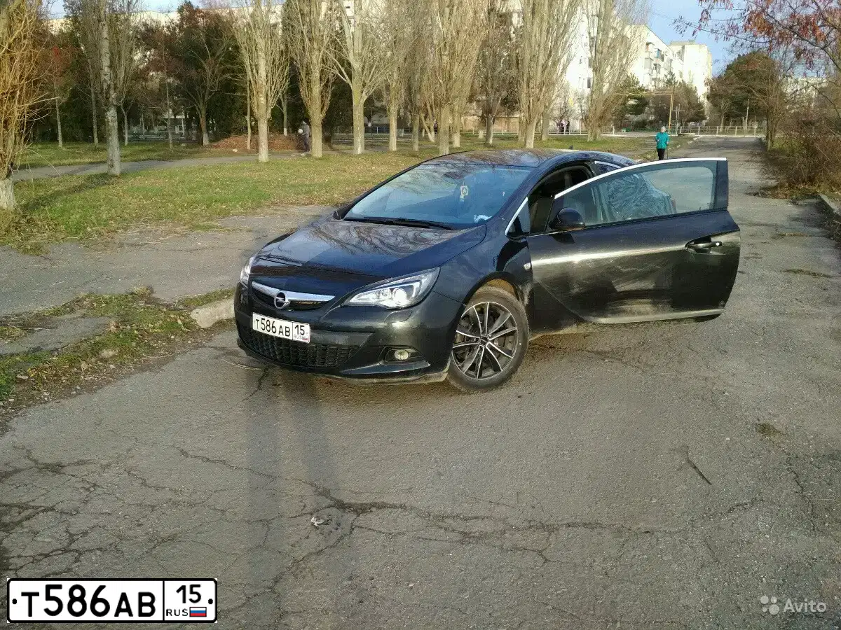 Фото автомобиля OPEL ASTRA, 2013 — госномер Н523АА82. Цвет: ЧЕРНЫЙ