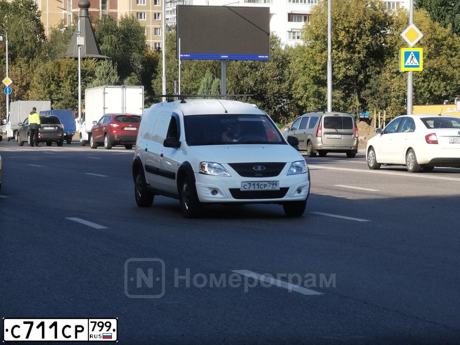 Фото автомобиля LADA LARGUS FURGON, 2015 — госномер С711СР799. Цвет: Белый