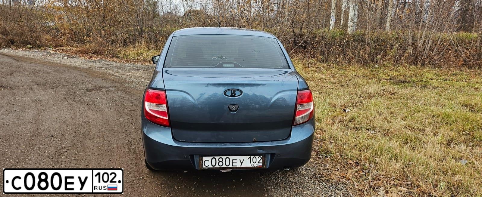 Фото автомобиля LADA GRANTA, 2015 — госномер М970ОР702. Цвет: Серо-Синий