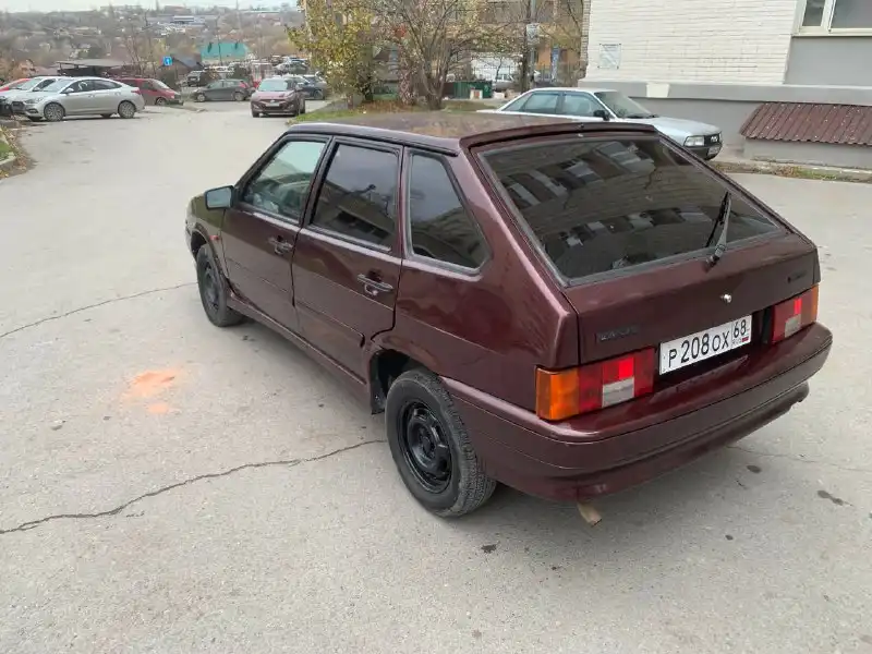 Фото автомобиля LADA 2114 SAMARA, 2012 — госномер Р208ОХ68. Цвет: ТЕМНО ВИШНЕВЫЙ