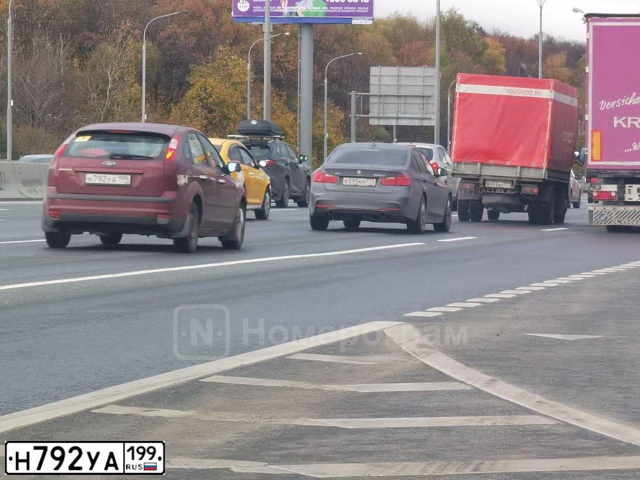 Фото автомобиля FORD FOCUS, 2007 — госномер О312ВА550. Цвет: ВИШНЕВЫЙ