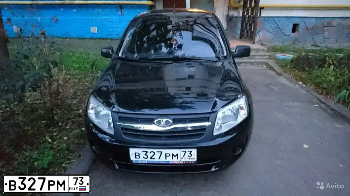 Фото автомобиля LADA 2190 GRANTA, 2013 — госномер Т290КХ73. Цвет: ЧЕРНЫЙ