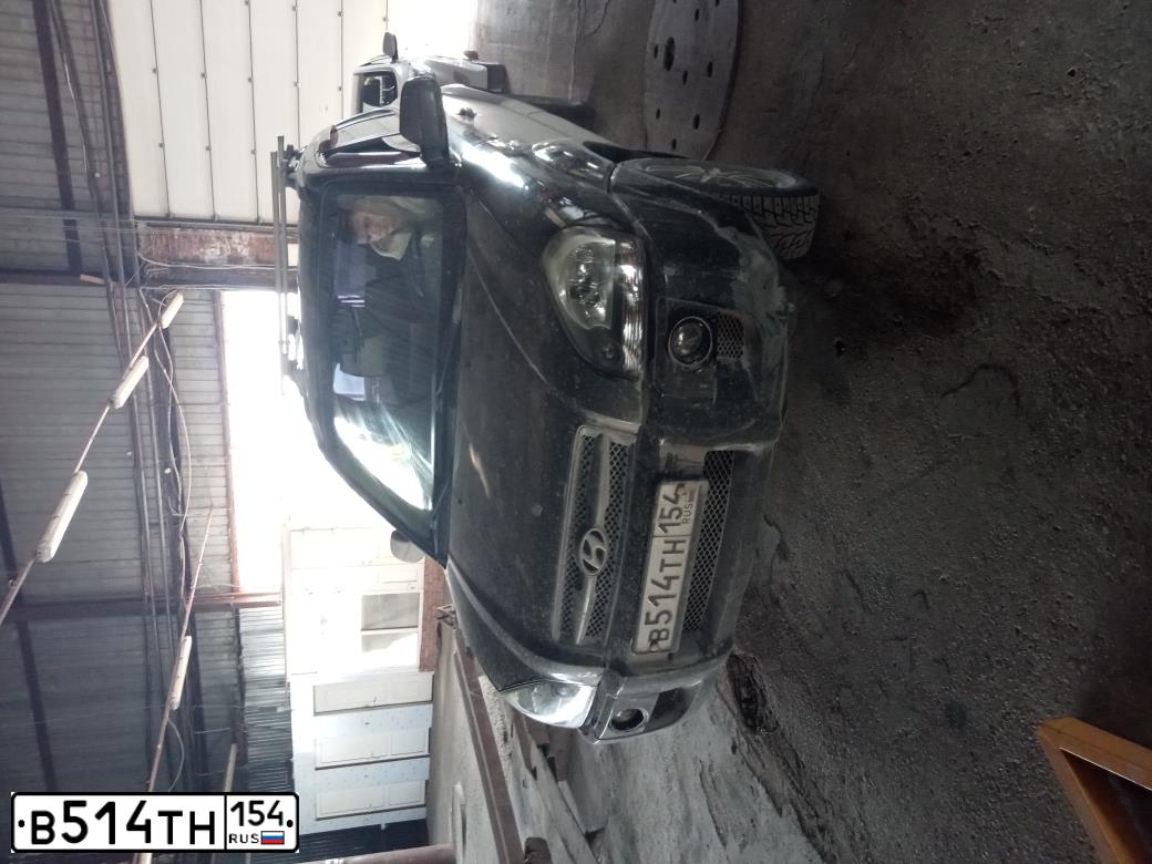 Фото автомобиля HYUNDAI TUCSON, 2007 — госномер В514ТН154. Цвет: ЧЕРНЫЙ
