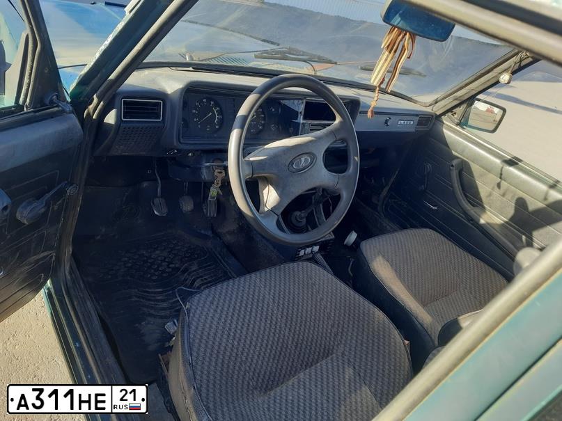 Фото автомобиля LADA 2107, 2007 — госномер А311НЕ21. Цвет: ТЕМНО-ЗЕЛЕНЫЙ