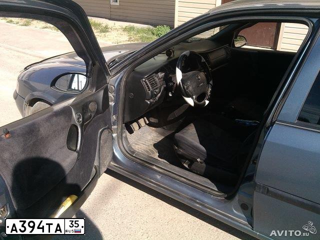 Фото автомобиля OPEL VECTRA, 1998 — госномер А394ТА35. Цвет: СЕРО-ГОЛУБОЙ