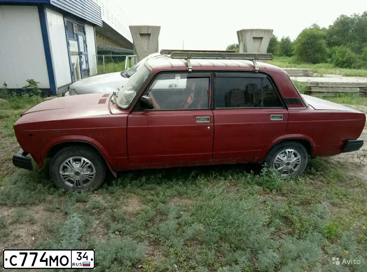 Фото автомобиля LADA 2107, 1996 — госномер С774МО34. Цвет: ВИШНЕВЫЙ