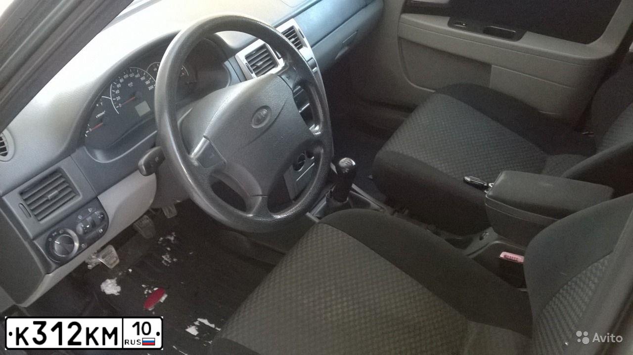 Фото автомобиля LADA 2172 PRIORA, 2009 — госномер К312КМ10. Цвет: СЕРО-СИНЕ-ЗЕЛЕНЫЙ