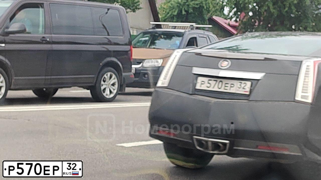 Фото автомобиля CADILLAC CTS, 2013 — госномер О647ЕХ977. Цвет: ЧЕРНЫЙ МЕТАЛЛИК