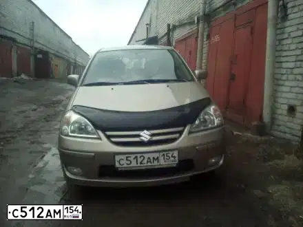 Фото автомобиля SUZUKI LIANA, 2004 — госномер К626АС154. Цвет: БЕЖЕВЫЙ