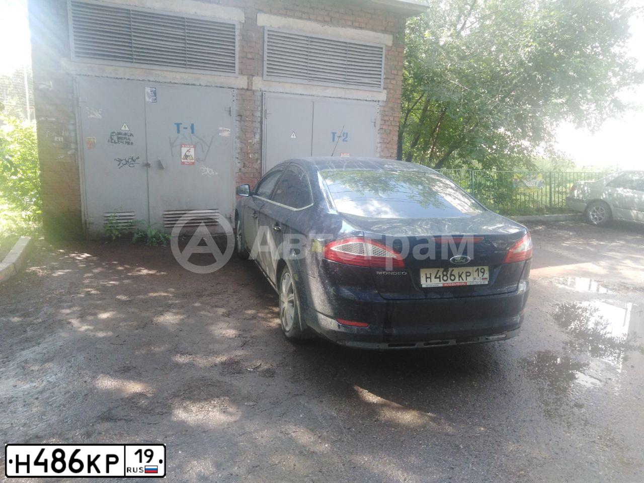 Фото автомобиля FORD MONDEO, 2010 — госномер Т003ТУ38. Цвет: ТЕМНО-СИНИЙ